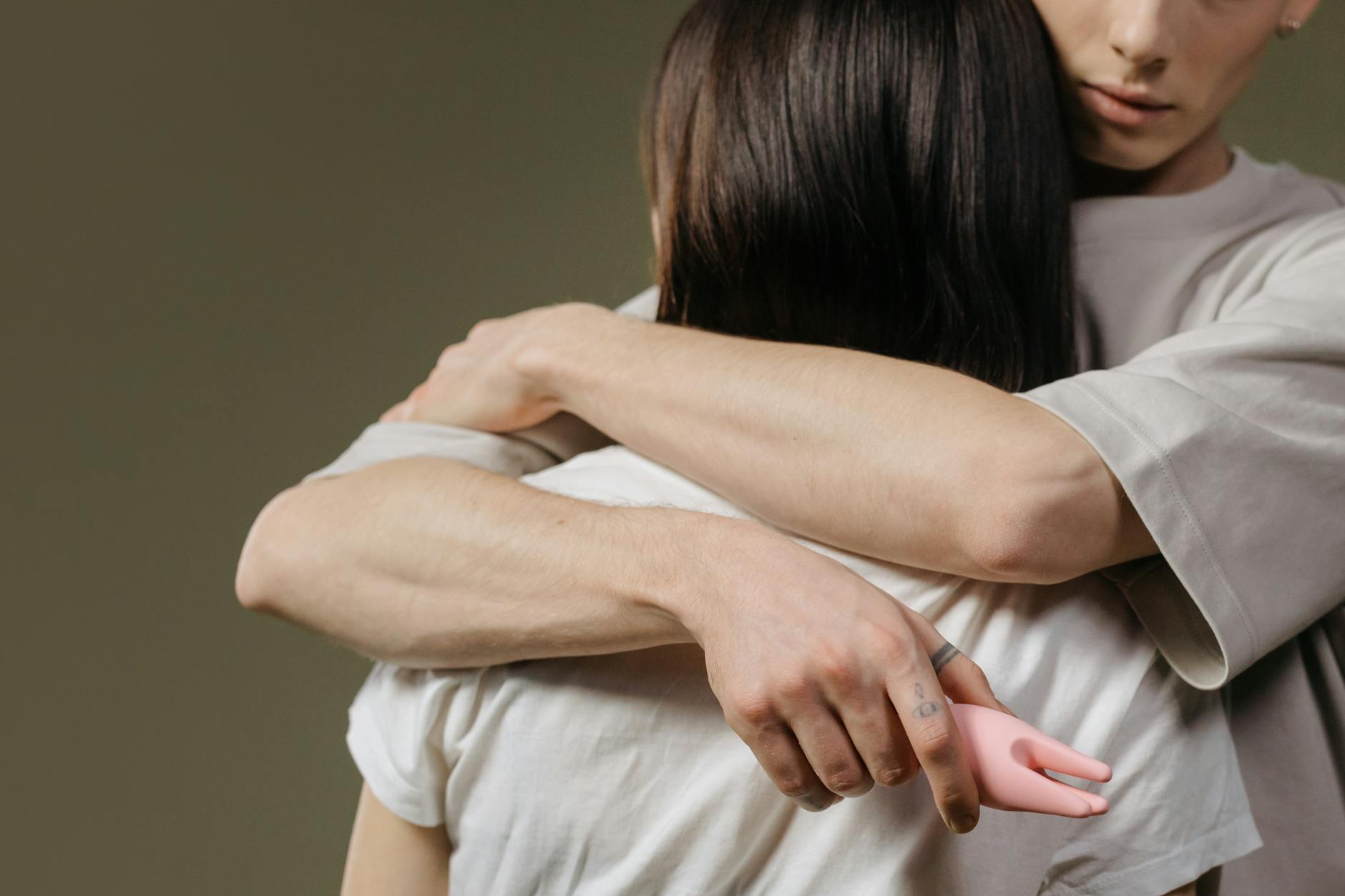 A couple embracing with intimacy and connection in close-up.